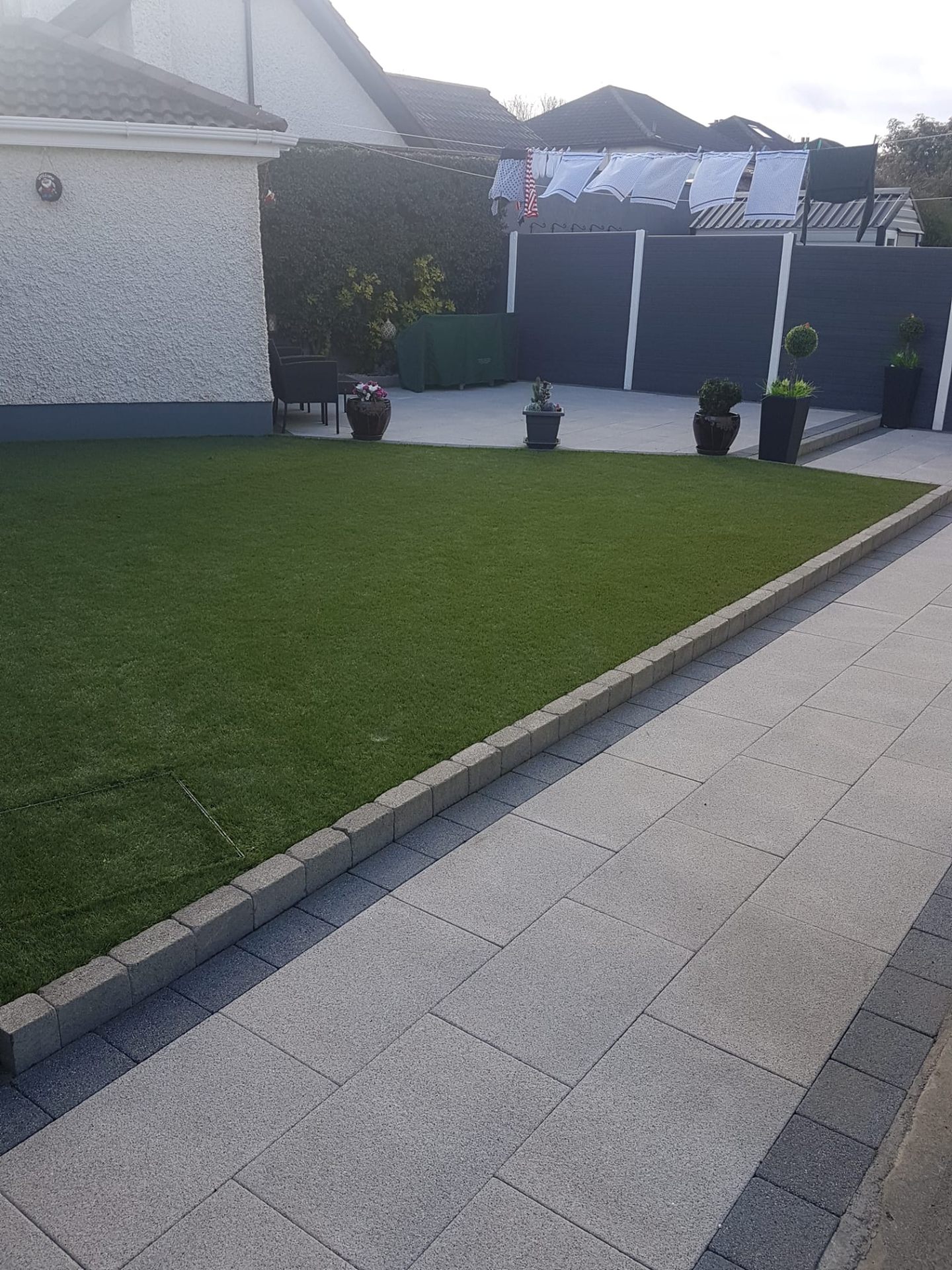 Natural stone granite patio with lawn